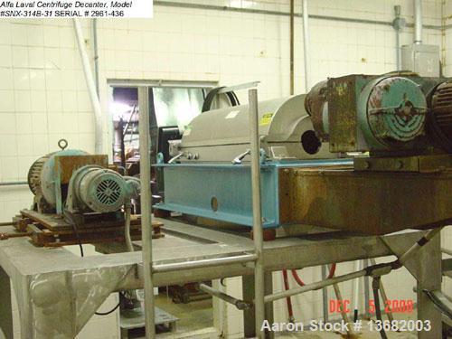 Used Delaval SNX-314B-31 "Sanitary" Solid Bowl Decanter Centrifuge. 316 stainless steel construction on product contact areas, sanitary polished double lead conveyor, double row on non-lined solids d...