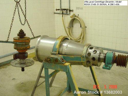 Used Delaval SNX-314B-31 "Sanitary" Solid Bowl Decanter Centrifuge. 316 stainless steel construction on product contact areas, sanitary polished double lead conveyor, double row on non-lined solids d...