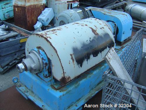 USED: Dorr-Oliver 12L solid bowl decanter centrifuge, 316 stainless steel. Max bowl speed 5500 rpm, 8 deg contour bowl, centripetal pump on liquid discharge, cake discharge race track, external pool ...