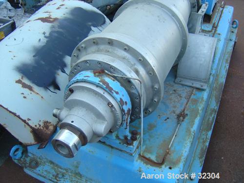USED: Dorr-Oliver 12L solid bowl decanter centrifuge, 316 stainless steel. Max bowl speed 5500 rpm, 8 deg contour bowl, centripetal pump on liquid discharge, cake discharge race track, external pool ...