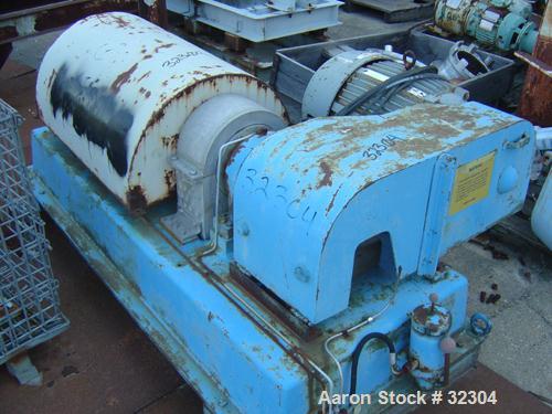USED: Dorr-Oliver 12L solid bowl decanter centrifuge, 316 stainless steel. Max bowl speed 5500 rpm, 8 deg contour bowl, centripetal pump on liquid discharge, cake discharge race track, external pool ...