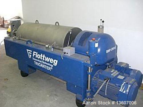 Used Flottweg Z-4-3/411 Solid Bowl Decanter Centrifuge, 3 phase/3 way, 15 cubic meters capacity per hour, material of construction is stainless steel on product contact parts, max bowl speed is 3500 ...