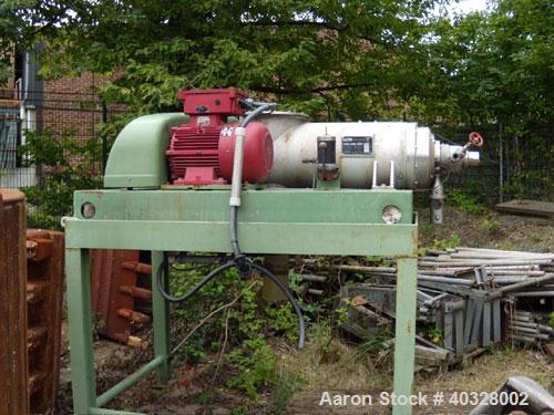 Used Flottweg Decanter, Type Z1-L. Material of construction is stainless steel on product contact parts. Max bowl speed 4500 rpm by a 33 hp/22 kw-380 volt/50 cycle/3 ph belt driven motor. Complete wi...