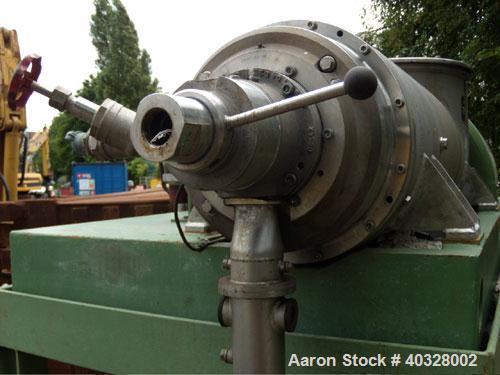 Used Flottweg Decanter, Type Z1-L. Material of construction is stainless steel on product contact parts. Max bowl speed 4500 rpm by a 33 hp/22 kw-380 volt/50 cycle/3 ph belt driven motor. Complete wi...