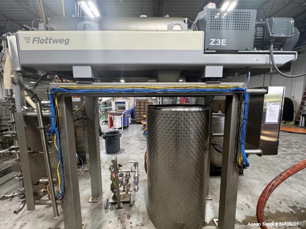 Used Flottweg Decanter Centrifuge, Model Z3E-4/401. Maximum bowl speed 5250 RPM. Maximum sediment density 1.6 kg/dm3. Stainless steel product contact areas, food grade. Cone angled at 8 degrees. 15 H...
