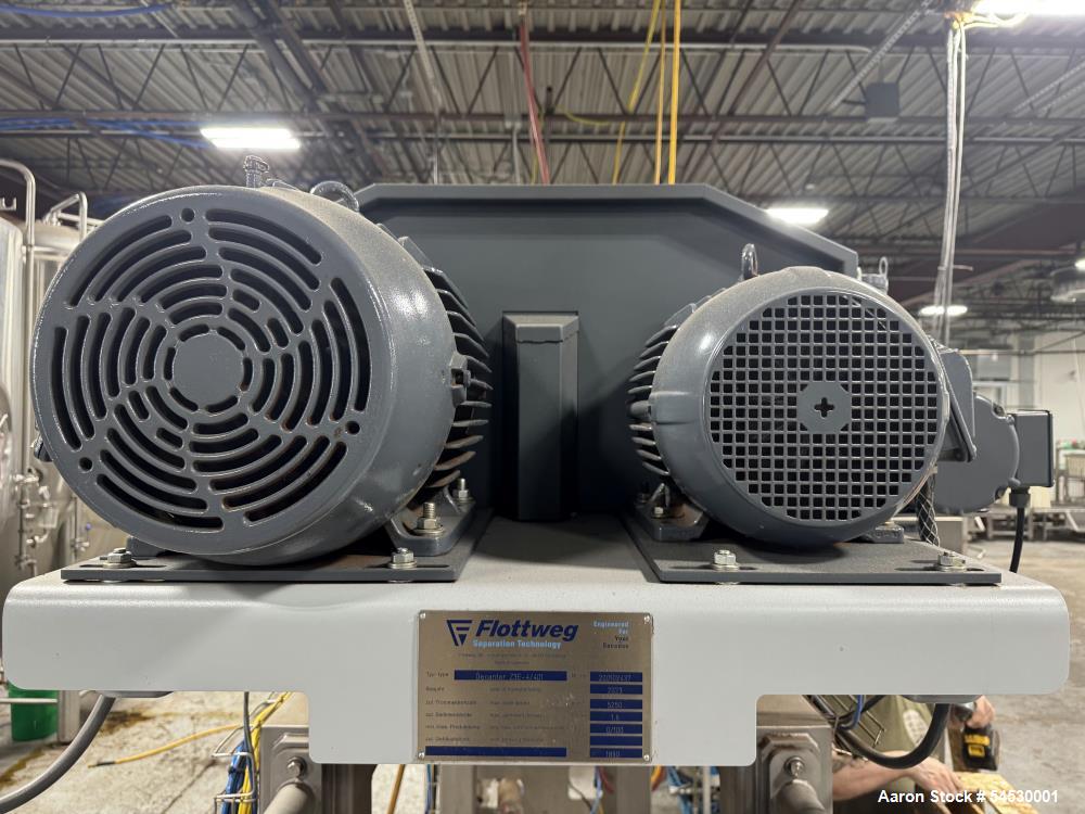 Used Flottweg Decanter Centrifuge, Model Z3E-4/401. Maximum bowl speed 5250 RPM. Maximum sediment density 1.6 kg/dm3. Stainless steel product contact areas, food grade. Cone angled at 8 degrees. 15 H...