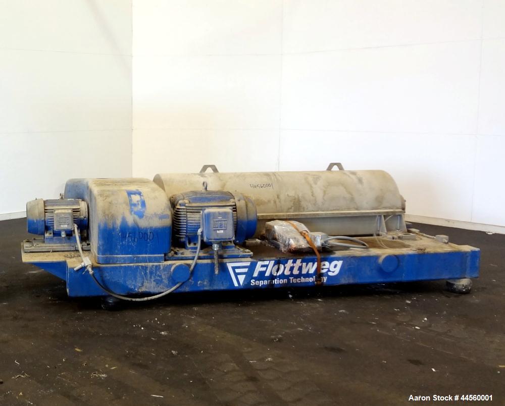 Used Flottweg Z53-4/454 Solid Bowl Horizontal Decanter Centrifuge. 2250 Stainless steel construction (product contact areas), max bowl speed 3250 rpm, single lead conveyor, gearbox, feed pipe, lubric...