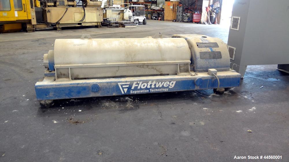 Used Flottweg Z53-4/454 Solid Bowl Horizontal Decanter Centrifuge. 2250 Stainless steel construction (product contact areas), max bowl speed 3250 rpm, single lead conveyor, gearbox, feed pipe, lubric...