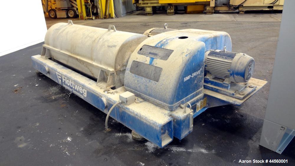 Used Flottweg Z53-4/454 Solid Bowl Horizontal Decanter Centrifuge. 2250 Stainless steel construction (product contact areas), max bowl speed 3250 rpm, single lead conveyor, gearbox, feed pipe, lubric...
