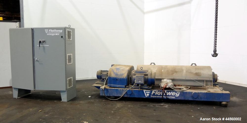 Used Flottweg Z53-4/454 Solid Bowl Horizontal Decanter Centrifuge. 2205 Stainless steel construction (product contact areas), max bowl speed 3250 rpm, single lead conveyor, gearbox, feed pipe, lubric...