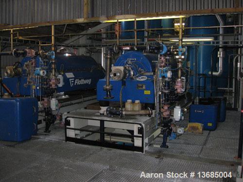Used Flottweg Z-6E-4/301g Solid Bowl Decanter Centrifuge. Hastelloy construction (product contact areas). Bowl speed 2500 rpm, bowl diameter 24.4" (620 mm), maximum working temperature 212 deg F (100...