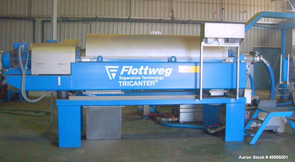 Used Flottweg Z6E-4/444 Tricanter Solid Bowl Decanter Centrifuge. Max bowl speed 3200 rpm, three phase separation (liquid/liquid/solids separation), conveyor, base, casing, feed pipe, grease lubricat...