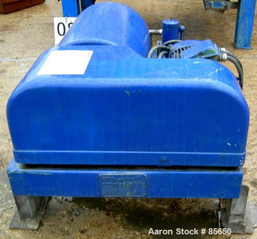 USED: Flottweg solid bowl horizontal decanter centrifuge, model ZL1, 319 stainless steel. Approximate 9" bowl diameter, 6000 bowl rpm, max density 5G/CM3, temp range 90 deg C. Approximate 3" hard fac...