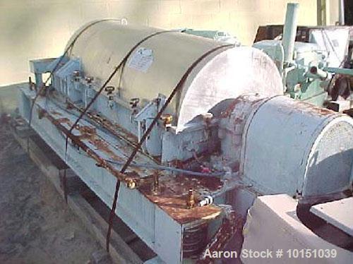 Used IHI HS-505 Solid Bowl Tricanter Centrifuge. Stainless steel construction (product contact areas), max bowl speed 3550, 3500 x "G" force, 4" single lead conveyor with hardfacing, ceramic lined ca...