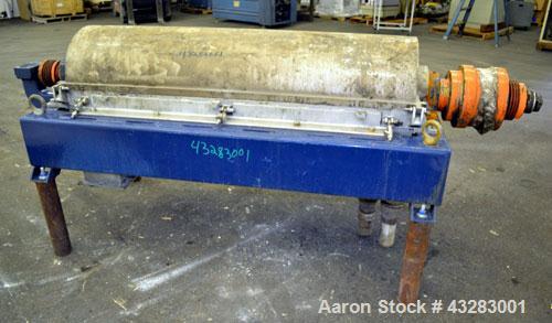 Used Alfa Laval NX-418 (2 or 3 phase) Solid Bowl Decanter Centrifuge. 316 Stainless steel construction (product contact areas), maximum bowl speed 3250 rpm, single row of lined cake discharge ports, ...