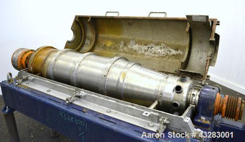 Used Alfa Laval NX-418 (2 or 3 phase) Solid Bowl Decanter Centrifuge. 316 Stainless steel construction (product contact areas), maximum bowl speed 3250 rpm, single row of lined cake discharge ports, ...