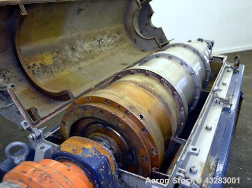 Used Alfa Laval NX-418 (2 or 3 phase) Solid Bowl Decanter Centrifuge. 316 Stainless steel construction (product contact areas), maximum bowl speed 3250 rpm, single row of lined cake discharge ports, ...