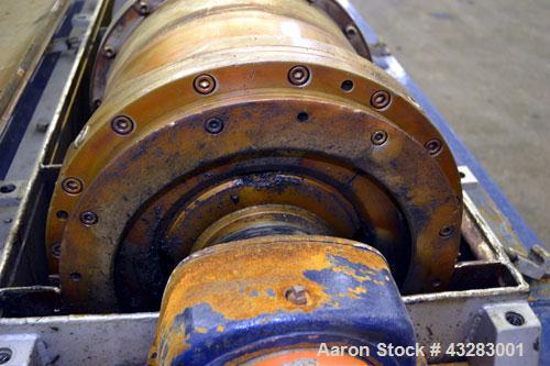 Used Alfa Laval NX-418 (2 or 3 phase) Solid Bowl Decanter Centrifuge. 316 Stainless steel construction (product contact areas), maximum bowl speed 3250 rpm, single row of lined cake discharge ports, ...