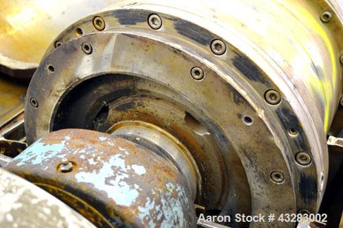 Used Alfa Laval NX-418 (2 or 3 phase) Solid Bowl Decanter Centrifuge. 316 Stainless steel construction (product contact areas), maximum bowl speed 3250 rpm, single row of lined cake discharge ports, ...
