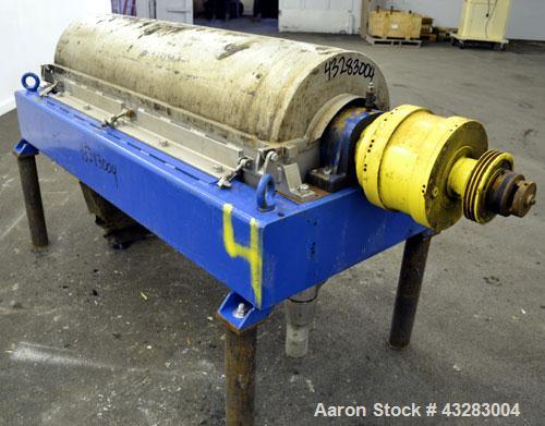 Used Alfa Laval NX-418 (2 or 3 phase) Solid Bowl Decanter Centrifuge. 316 Stainless steel construction (product contact areas), maximum bowl speed 3250 rpm, single row of lined cake discharge ports, ...
