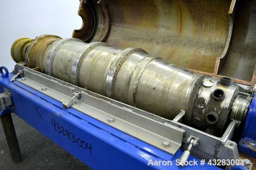 Used Alfa Laval NX-418 (2 or 3 phase) Solid Bowl Decanter Centrifuge. 316 Stainless steel construction (product contact areas), maximum bowl speed 3250 rpm, single row of lined cake discharge ports, ...