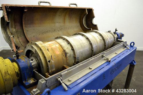 Used Alfa Laval NX-418 (2 or 3 phase) Solid Bowl Decanter Centrifuge. 316 Stainless steel construction (product contact areas), maximum bowl speed 3250 rpm, single row of lined cake discharge ports, ...