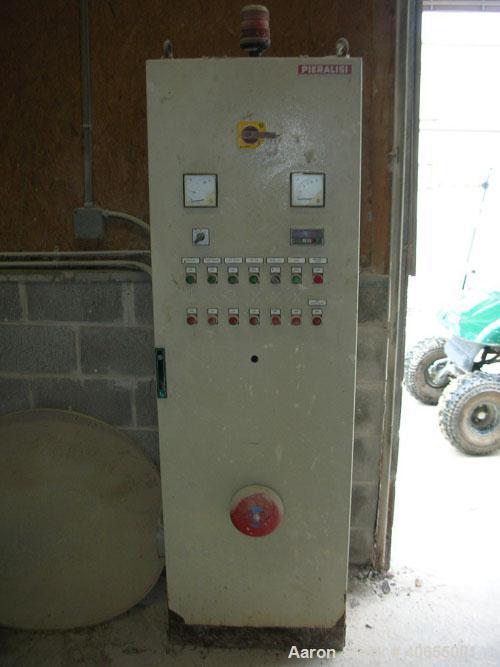 Used Pieralisi model Baby 1 solid bowl decanter centrifuge. Max bowl speed 5200 rpm, 35000 x "G" force. Includes casing/stand, cyclo gearbox, 5.5 kW drive motor, feed pipe, control.