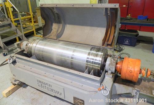 Used Sharples PM-35000 Super-D-Canter Centrifuge, max bowl speed 3250, single lead conveyor w/STC wear protection tiles, 360 degree solids discharge ports w/STC wear liners, moon liquid plate dams, b...