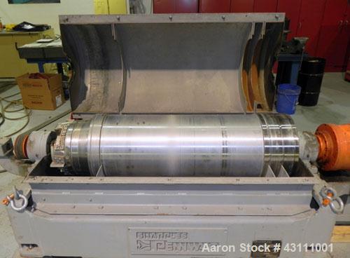 Used Sharples PM-35000 Super-D-Canter Centrifuge, max bowl speed 3250, single lead conveyor w/STC wear protection tiles, 360 degree solids discharge ports w/STC wear liners, moon liquid plate dams, b...