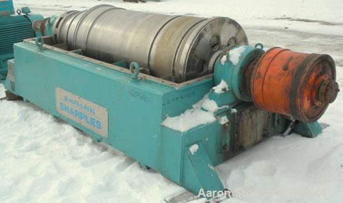 Used Sharples DS-705 Super-D-Canter Centrifuge, 317 stainless steel construction (product contact areas), 10" single lead conveyor with STC tiles, 360 degree solid discharge ports with replaceable si...