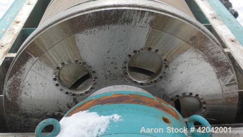 Used Sharples DS-705 Super-D-Canter Centrifuge, 317 stainless steel construction (product contact areas), 10" single lead conveyor with STC tiles, 360 degree solid discharge ports with replaceable si...