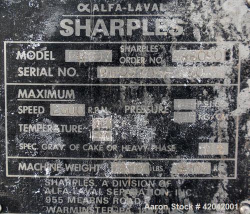 Used Sharples DS-705 Super-D-Canter Centrifuge, 317 stainless steel construction (product contact areas), 10" single lead conveyor with STC tiles, 360 degree solid discharge ports with replaceable si...
