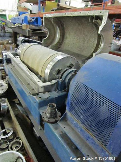 Used Sharples DSNX-4230 Super-D-Canter Centrifuge. (Unit is similar/identical to PM-35000.) Stainless steel construction on product contact areas. Max bowl speed 3650 rpm. 16.6" diameter x 49" straig...