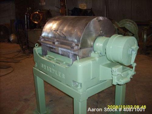 Used Sharples P-2000 Super-D-Canter Centrifuge. 316 stainless steel construction on product contact areas, max bowl speed 3240 rpm, single lead conveyor, 1,2,3,4 slotted liquid plate dam, gearbox wit...