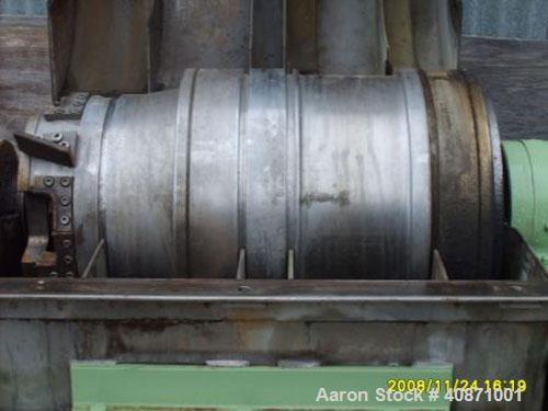 Used Sharples P-2000 Super-D-Canter Centrifuge. 316 stainless steel construction on product contact areas, max bowl speed 3240 rpm, single lead conveyor, 1,2,3,4 slotted liquid plate dam, gearbox wit...