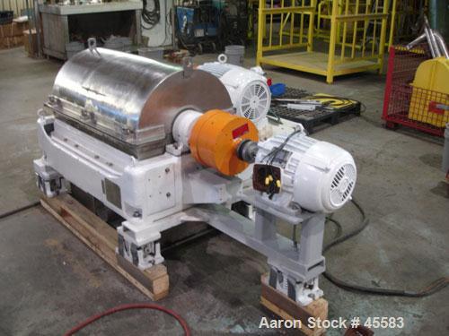 RECONDITIONED: Sharples sanitary P-3000 Super-D-Canter centrifuge, 316 stainless steel. Max bowl speed 4000 rpm. Contour bowl design, hogged out cake ports, 3" single lead conveyor with hardfacing, e...