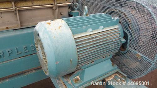 Used Sharples P-3400 Super-D-Canter Centrifuge. 316 Stainless steel construction (product contact areas), maximum bowl speed 4000 rpm, hogged out cake discharge ports with wear liners, 4.25" single l...