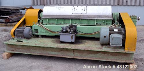 Used Sharples P-4800 Super-D-Canter Centrifuge. 316 Stainless steel construction (product contact areas), maximum bowl speed 3350 rpm, discharge ports with wear liners, 7" single lead conveyor welded...