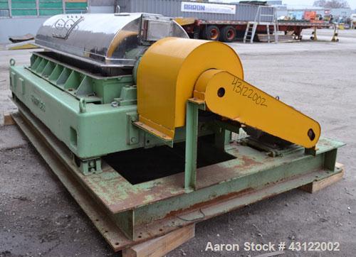 Used Sharples P-4800 Super-D-Canter Centrifuge. 316 Stainless steel construction (product contact areas), maximum bowl speed 3350 rpm, discharge ports with wear liners, 7" single lead conveyor welded...
