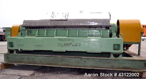 Used Sharples P-4800 Super-D-Canter Centrifuge. 316 Stainless steel construction (product contact areas), maximum bowl speed 3350 rpm, discharge ports with wear liners, 7" single lead conveyor welded...