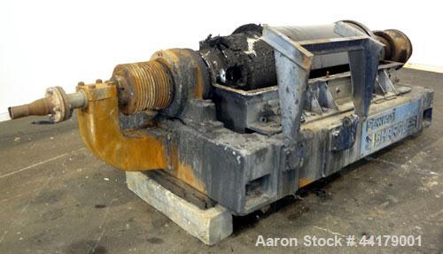 Used Sharples P-5000 Super-D-Canter Centrifuge. 316 Stainless steel product contact areas. Maximum bowl speed approximate 3000 rpm. 5" Pitch conveyor, base, casing, cover, and feed pipe.