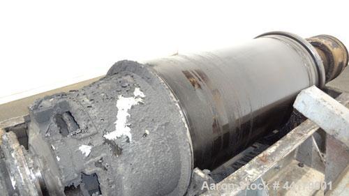 Used Sharples P-5000 Super-D-Canter Centrifuge. 316 Stainless steel product contact areas. Maximum bowl speed approximate 3000 rpm. 5" Pitch conveyor, base, casing, cover, and feed pipe.