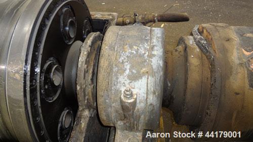 Used Sharples P-5000 Super-D-Canter Centrifuge. 316 Stainless steel product contact areas. Maximum bowl speed approximate 3000 rpm. 5" Pitch conveyor, base, casing, cover, and feed pipe.