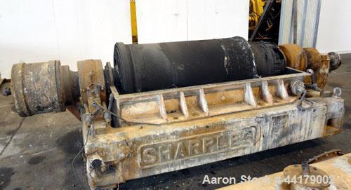 Used Sharples P-5000 Super-D-Canter Centrifuge. 316 Stainless steel product contact areas. Maximum bowl speed 3000 rpm. 5" Pitch conveyor, base, casing, cover, and feed pipe.