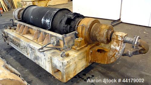 Used Sharples P-5000 Super-D-Canter Centrifuge. 316 Stainless steel product contact areas. Maximum bowl speed 3000 rpm. 5" Pitch conveyor, base, casing, cover, and feed pipe.