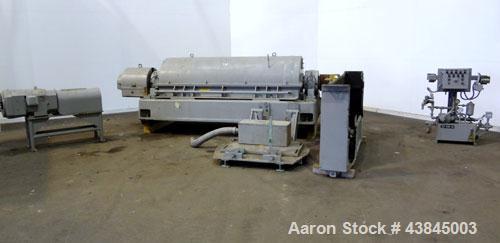 Used Sharples P-5400 Super-D-Canter Centrifuge. 316/317 Stainless steel construction (product contact areas). Maximum bowl speed 3000 rpm, 5” single lead conveyor with sintered tungsten carbide wear ...