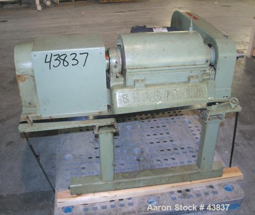 USED: Sharples P-660 Super-D-Canter centrifuge. 316 stainless steel. 2" single lead conveyor with hardfacing, cake flingers, cake discharge, parts not hogged out, poly type feed tube and yoke base, c...