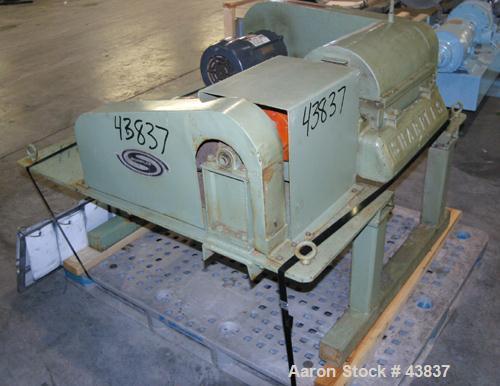 USED: Sharples P-660 Super-D-Canter centrifuge. 316 stainless steel. 2" single lead conveyor with hardfacing, cake flingers, cake discharge, parts not hogged out, poly type feed tube and yoke base, c...
