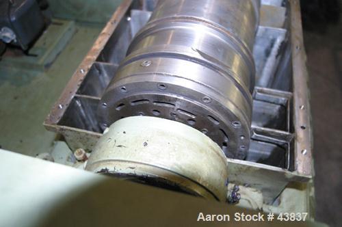 USED: Sharples P-660 Super-D-Canter centrifuge. 316 stainless steel. 2" single lead conveyor with hardfacing, cake flingers, cake discharge, parts not hogged out, poly type feed tube and yoke base, c...