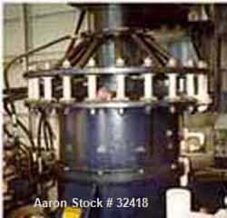 USED: Sharples P-6800 decanter in SS construction with 8.5" singlelead conveyor with STC tiles, 360 deg discharge with half-moon cakedischarge liners, large bolt pattern, planetary gearbox. 12.5" dri...